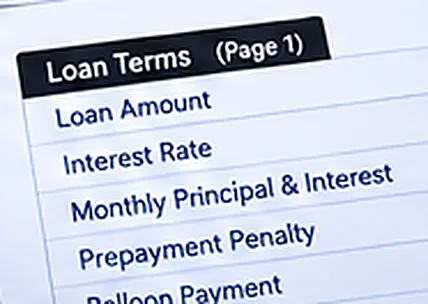 A document showing loan terms including loan amount, interest rate, monthly principal and interest, prepayment penalty, and balloon payment